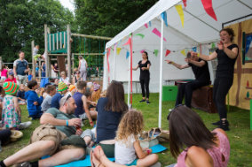 Lingfest 2019 children and adults watching the elves and shomaker story being told  ©Brett Butler